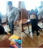 Elevă filmată în timp ce este bătută de un coleg, în aplauzele și râsetele colegilor